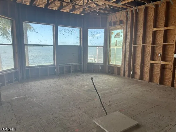 an empty room with windows