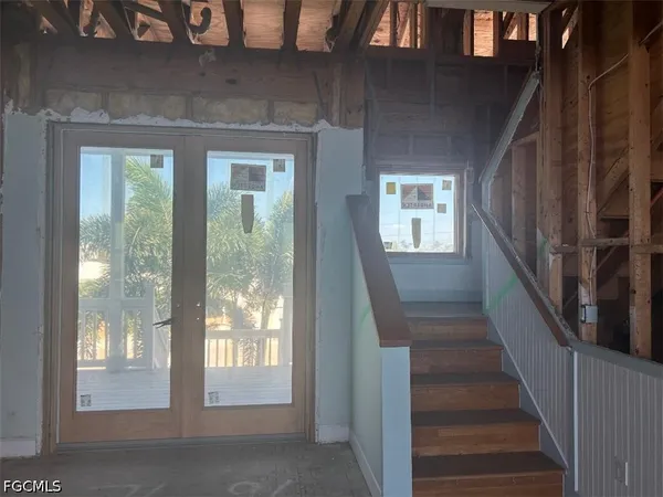 a view of a hallway with windows