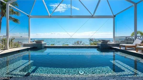 a view of a backyard both side of the house