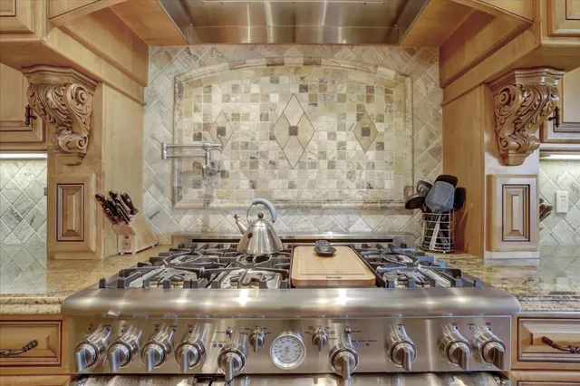 a bathroom with a mirror and a sink