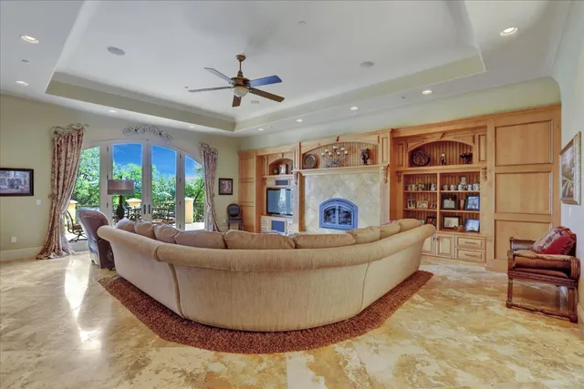 a view of a green field in the middle of a city