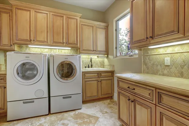 a view of a chairs and table in patio