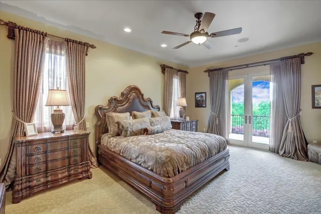 a kitchen with stainless steel appliances a stove a sink dishwasher and microwave with wooden floor