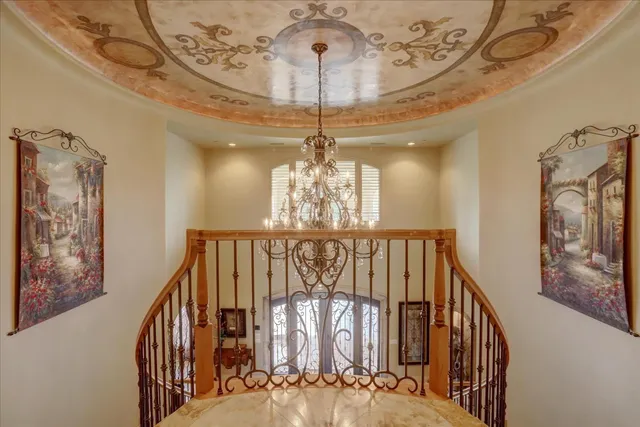 a view of a lake with couches in front of house