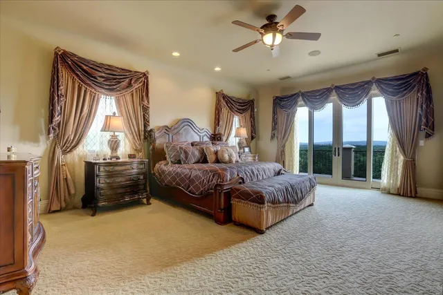 a view of a backyard with sitting area