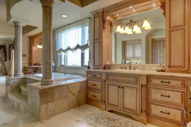 a living room with furniture and a ceiling fan