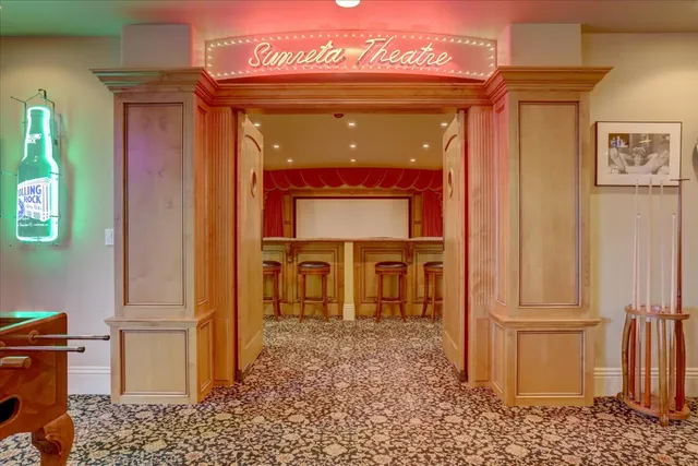 a view of a couches in a patio with a fountain
