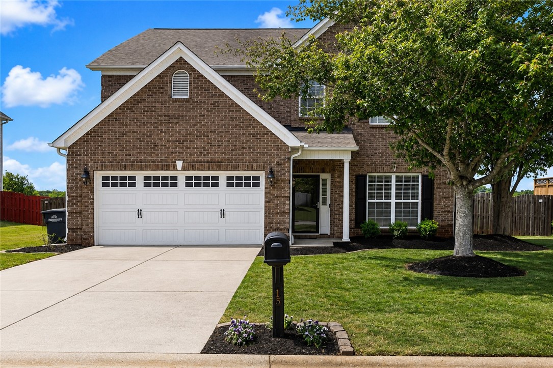 15 Fawn Hill Drive Anderson, SC 29621 - Photo 2 of 38 This classic brick residence features an attached garage and a manicured front lawn.