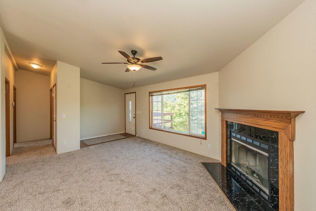 22169 Backbone Road Redding, CA 96003 - Photo 3 of 49 Wood burning fireplace