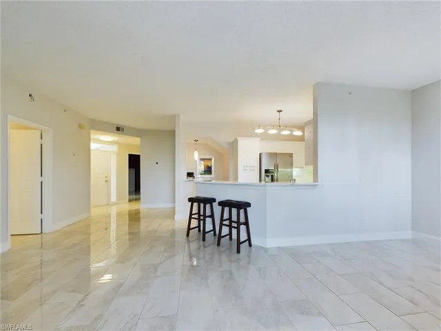 a view of a livingroom with furniture