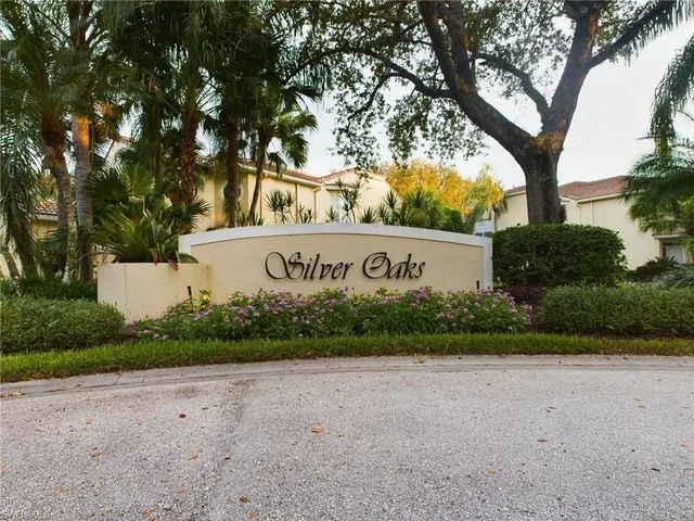 a view of outdoor space with garden and trees