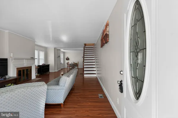 a view of a living room with furniture