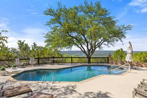 a view of a yard with an trees