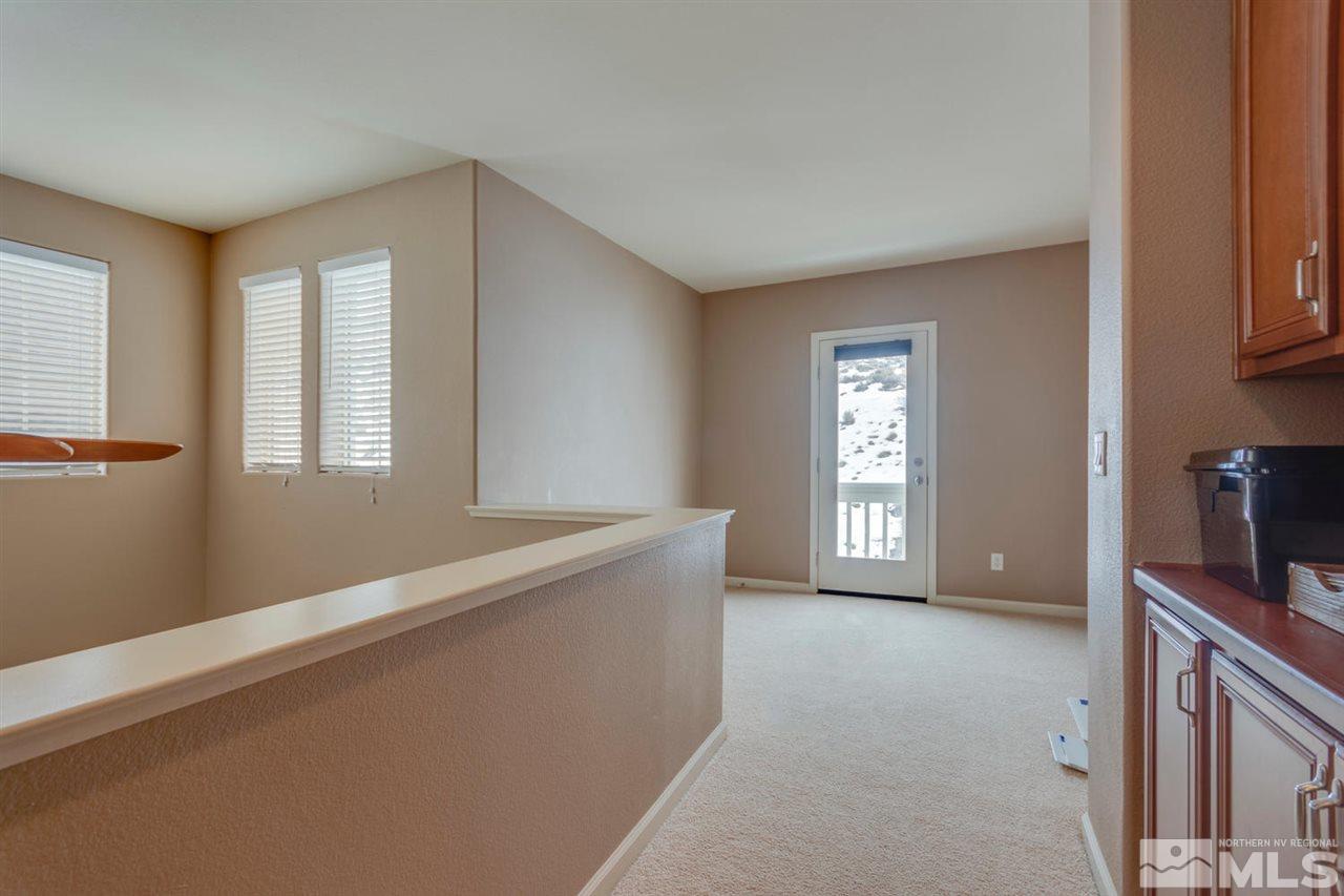 7660 Stone Bluff Way Reno, NV 89523 - Photo 13 of 22 a view of empty room with window