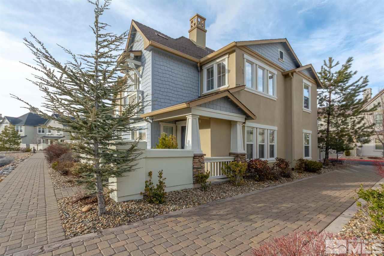 7660 Stone Bluff Way Reno, NV 89523 - Photo 2 of 22 a front view of a house with garden