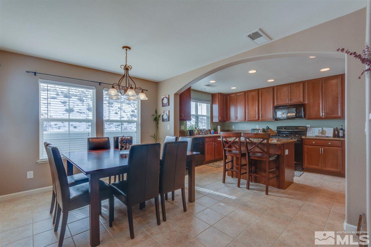 7660 Stone Bluff Way Reno, NV 89523 - Photo 5 of 22 a view of a dining room and livingroom