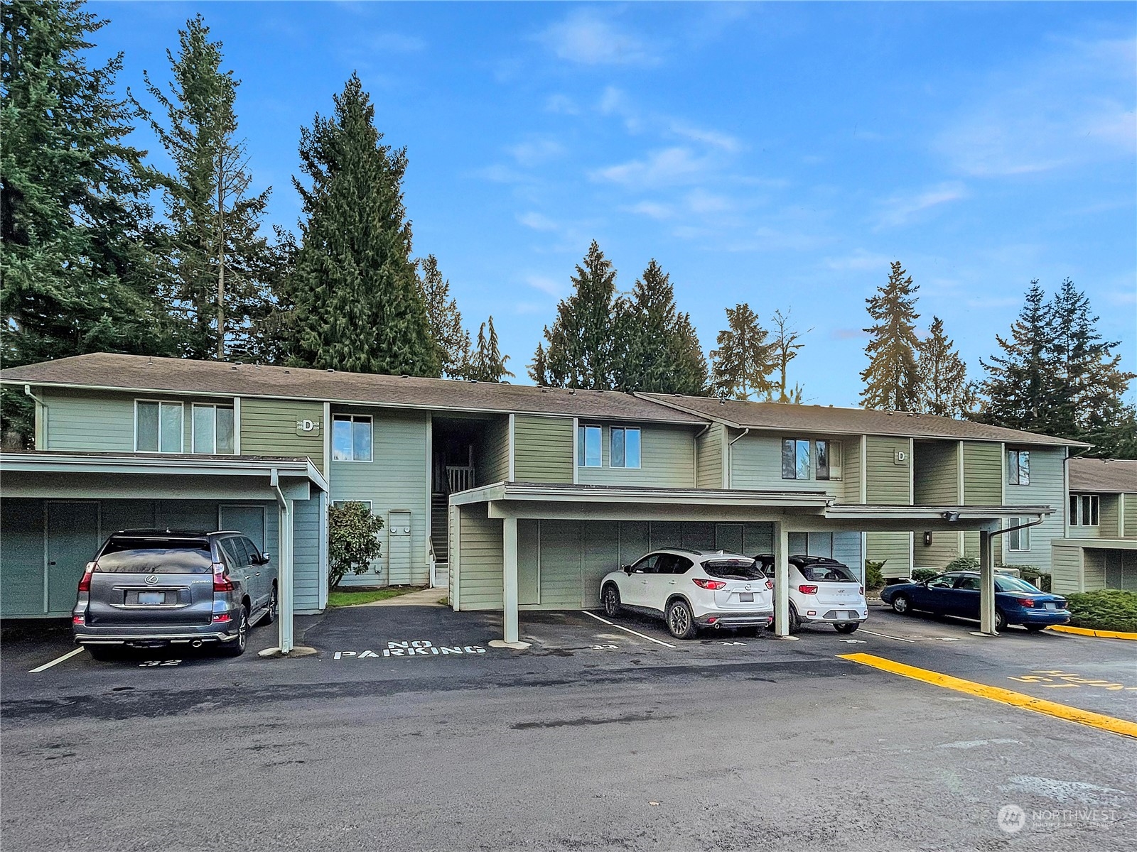 14401 Southeast Petrovitsky Road, Unit D105 Renton, WA 98058 - Photo 1 of 25 a car parked in front of a house