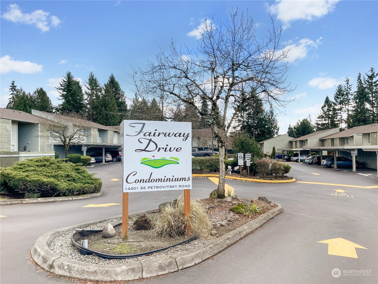 14401 Southeast Petrovitsky Road, Unit D105 Renton, WA 98058 - Photo 25 of 25 a sign on the side of a building
