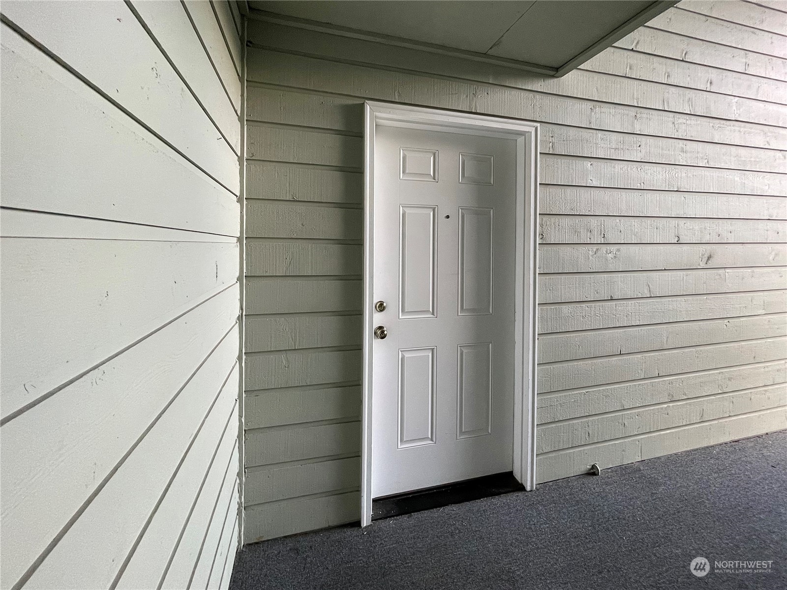 14401 Southeast Petrovitsky Road, Unit D105 Renton, WA 98058 - Photo 4 of 25 a view of front door
