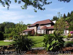 40 Wolfpen Road Waynesville, NC 28786 - Photo 1 of 9 a view of house and outdoor space