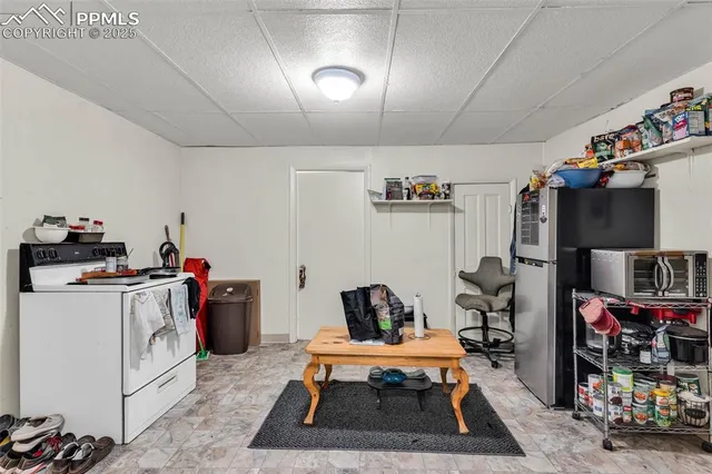 a view of a workspace with furniture