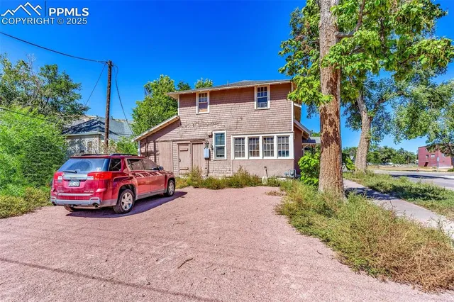 a car parked in front of a house