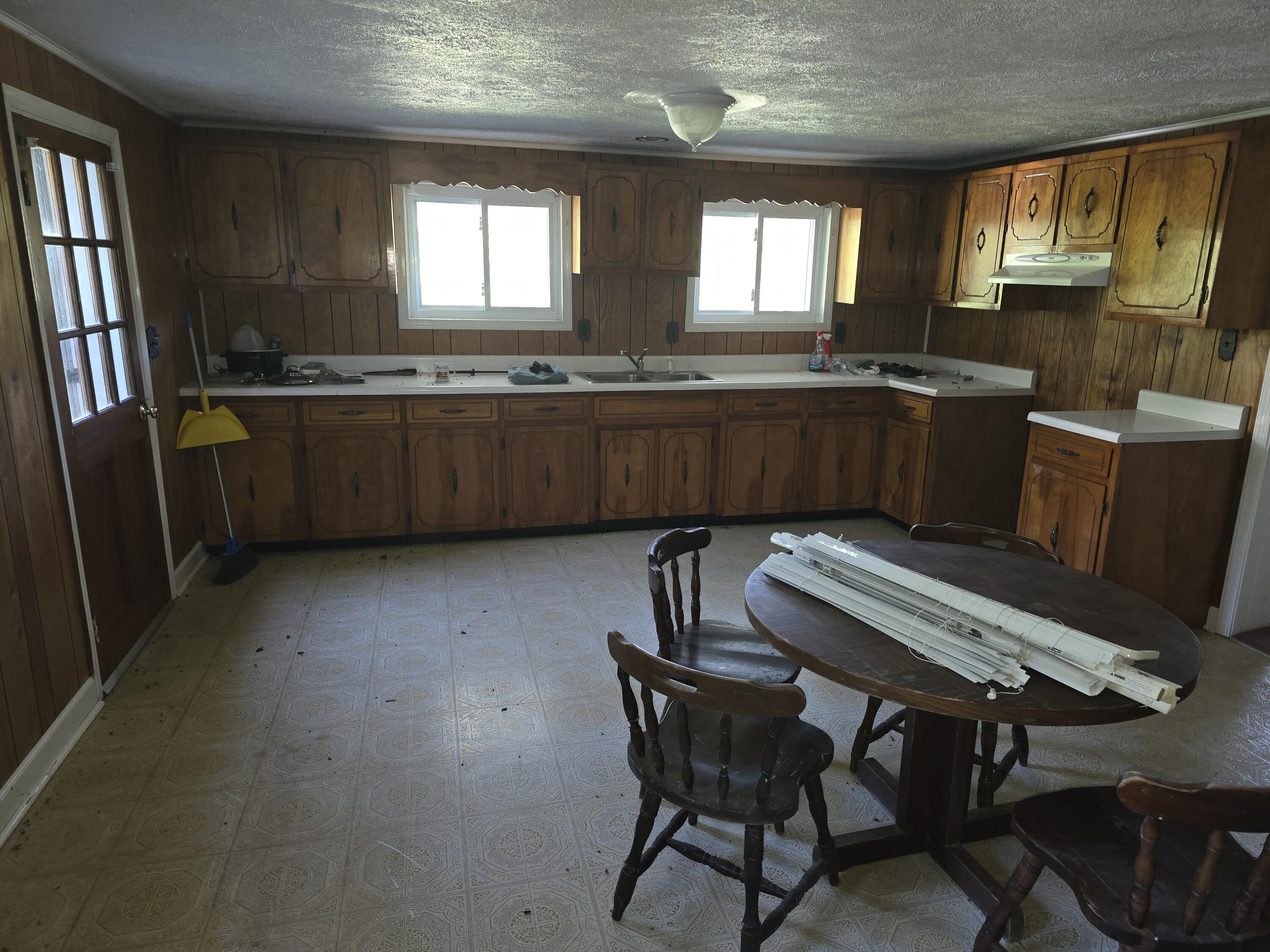 415 Stock Pen Mountain Road Narrows, VA 24124 - Photo 2 of 16 a kitchen with granite countertop a sink cabinets and window