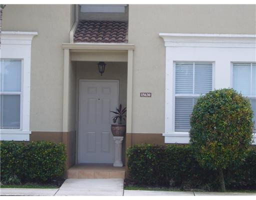 15630 Southwest 40th Street, Unit 192 Miramar, FL 33027 - Photo 2 of 10 a view of entryway with a yard