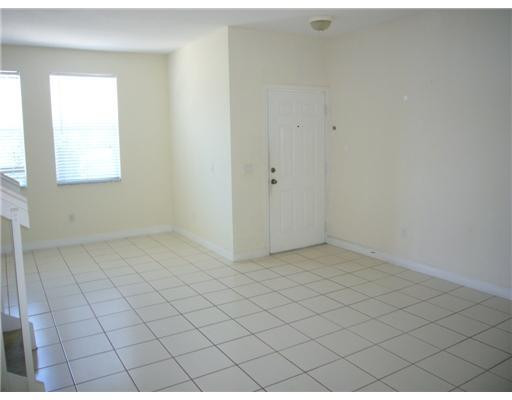 15630 Southwest 40th Street, Unit 192 Miramar, FL 33027 - Photo 3 of 10 a view of an empty room