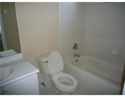 15630 Southwest 40th Street, Unit 192 Miramar, FL 33027 - Photo 9 of 10 a bathroom with a toilet and a sink