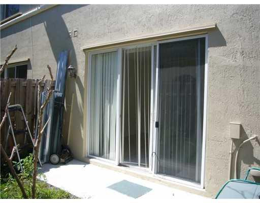 15630 Southwest 40th Street, Unit 192 Miramar, FL 33027 - Photo 10 of 10 a view of a door and a window