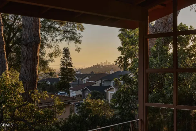 a view of a yard from a balcony