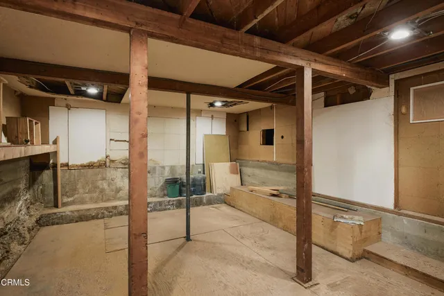 a bathroom with a tub and shower