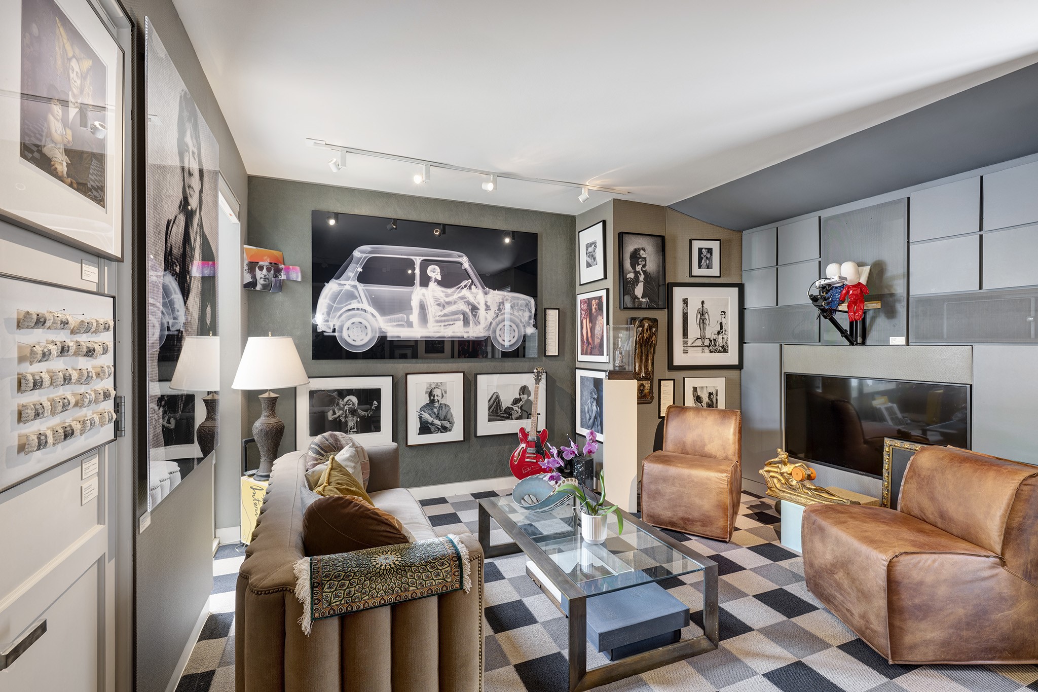 1814 Larchmont Road Houston, TX 77019 - Photo 12 of 29 a living room with furniture and a floor to ceiling window
