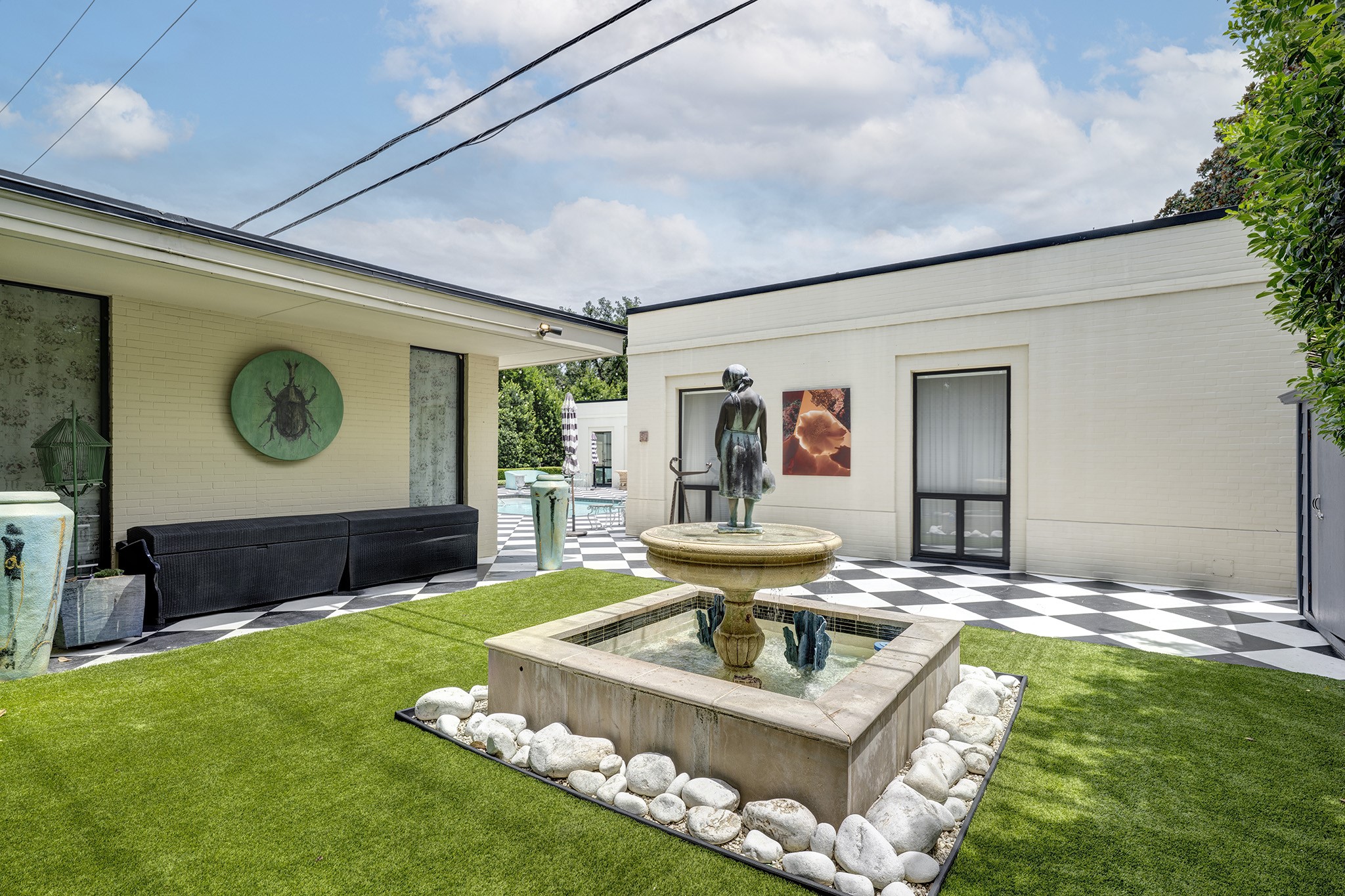 1814 Larchmont Road Houston, TX 77019 - Photo 22 of 29 a view of a house with a yard porch and furniture