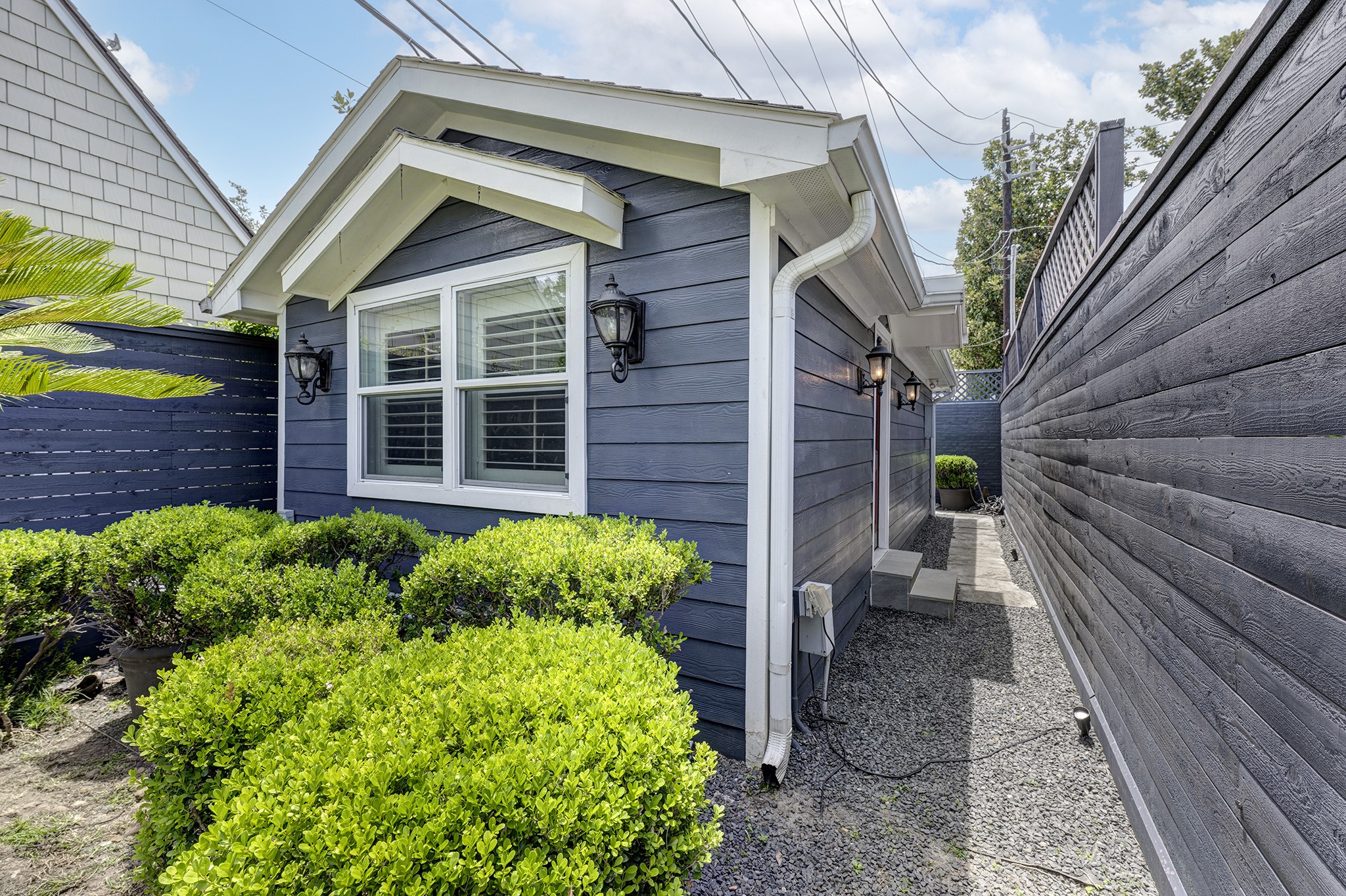 1814 Larchmont Road Houston, TX 77019 - Photo 28 of 29 a view of a house with a backyard