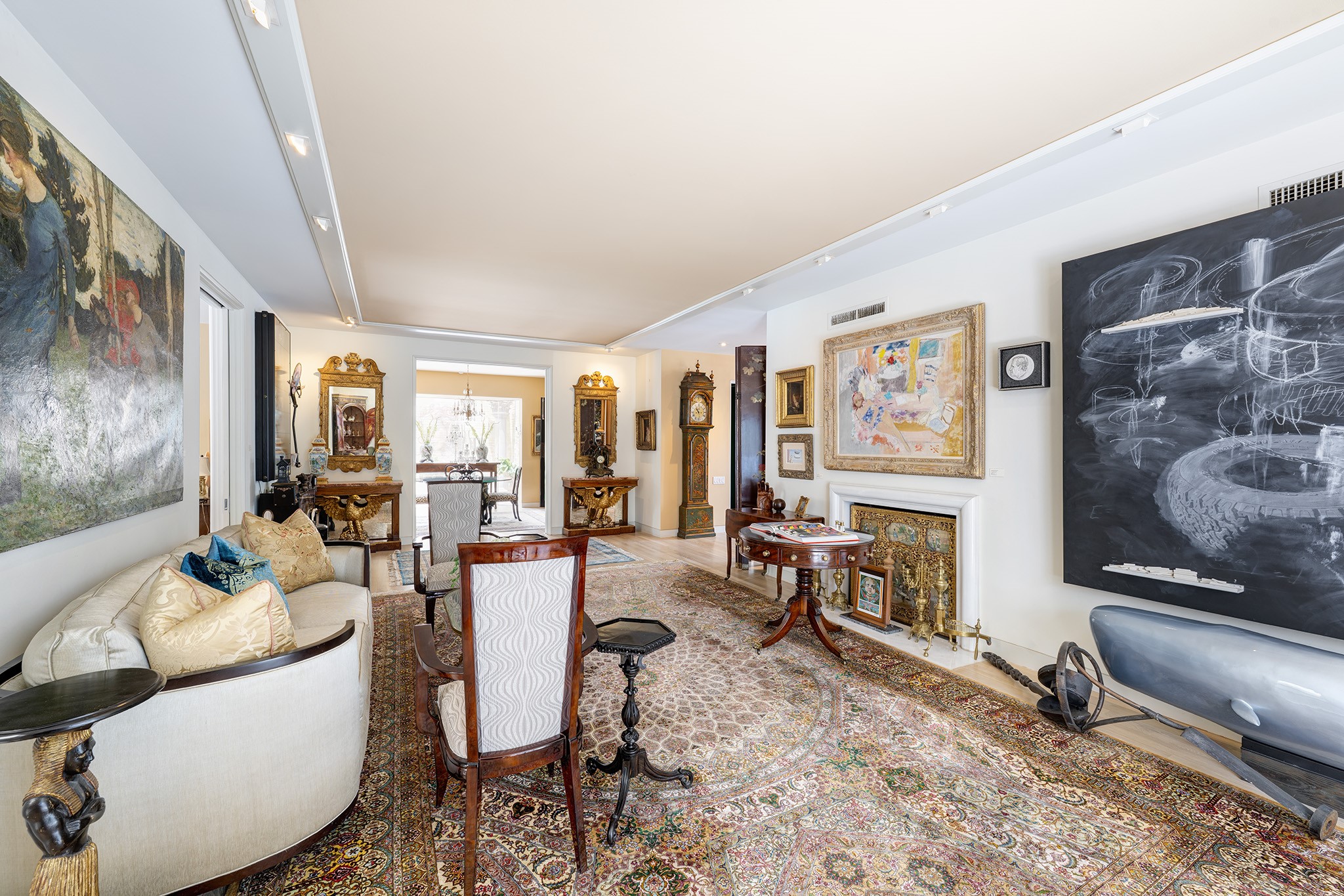 1814 Larchmont Road Houston, TX 77019 - Photo 4 of 29 a living room with furniture and a flat screen tv