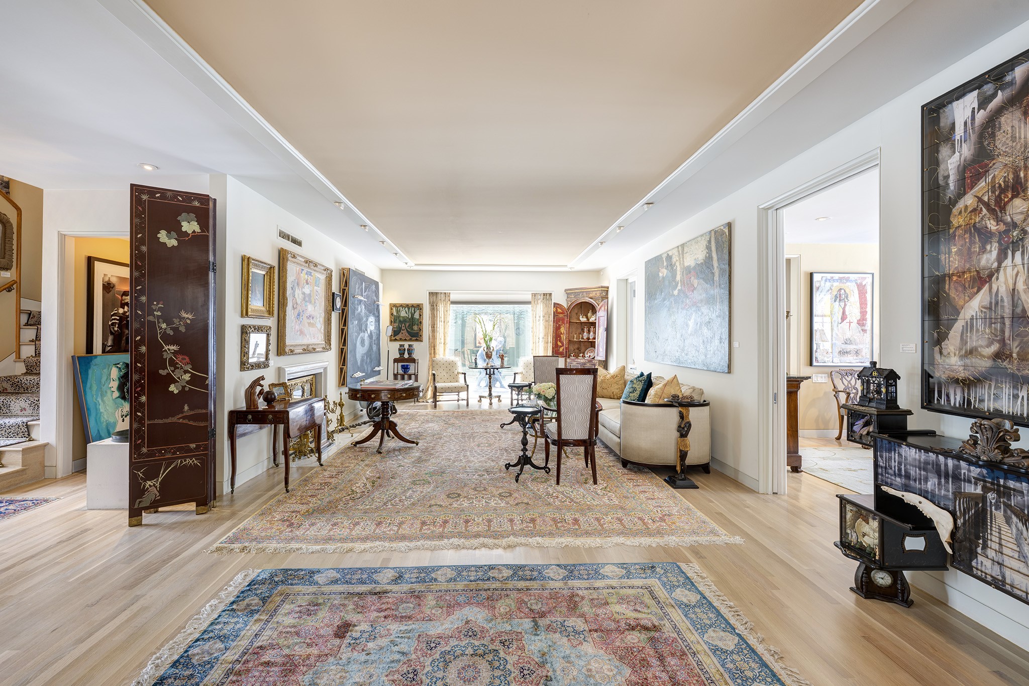 1814 Larchmont Road Houston, TX 77019 - Photo 5 of 29 a living room with furniture and wooden floor