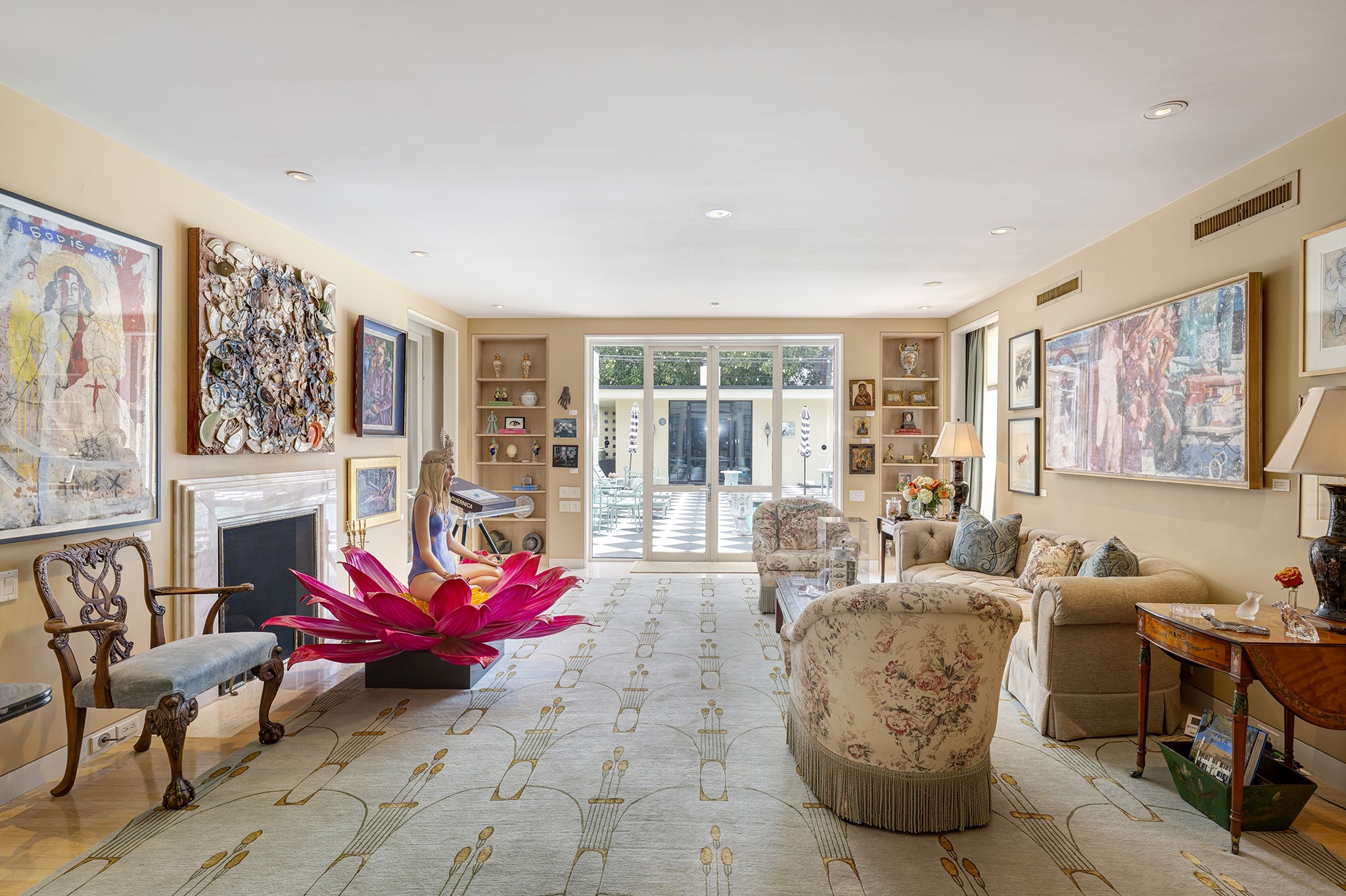 1814 Larchmont Road Houston, TX 77019 - Photo 8 of 29 a living room with fireplace furniture and a large window