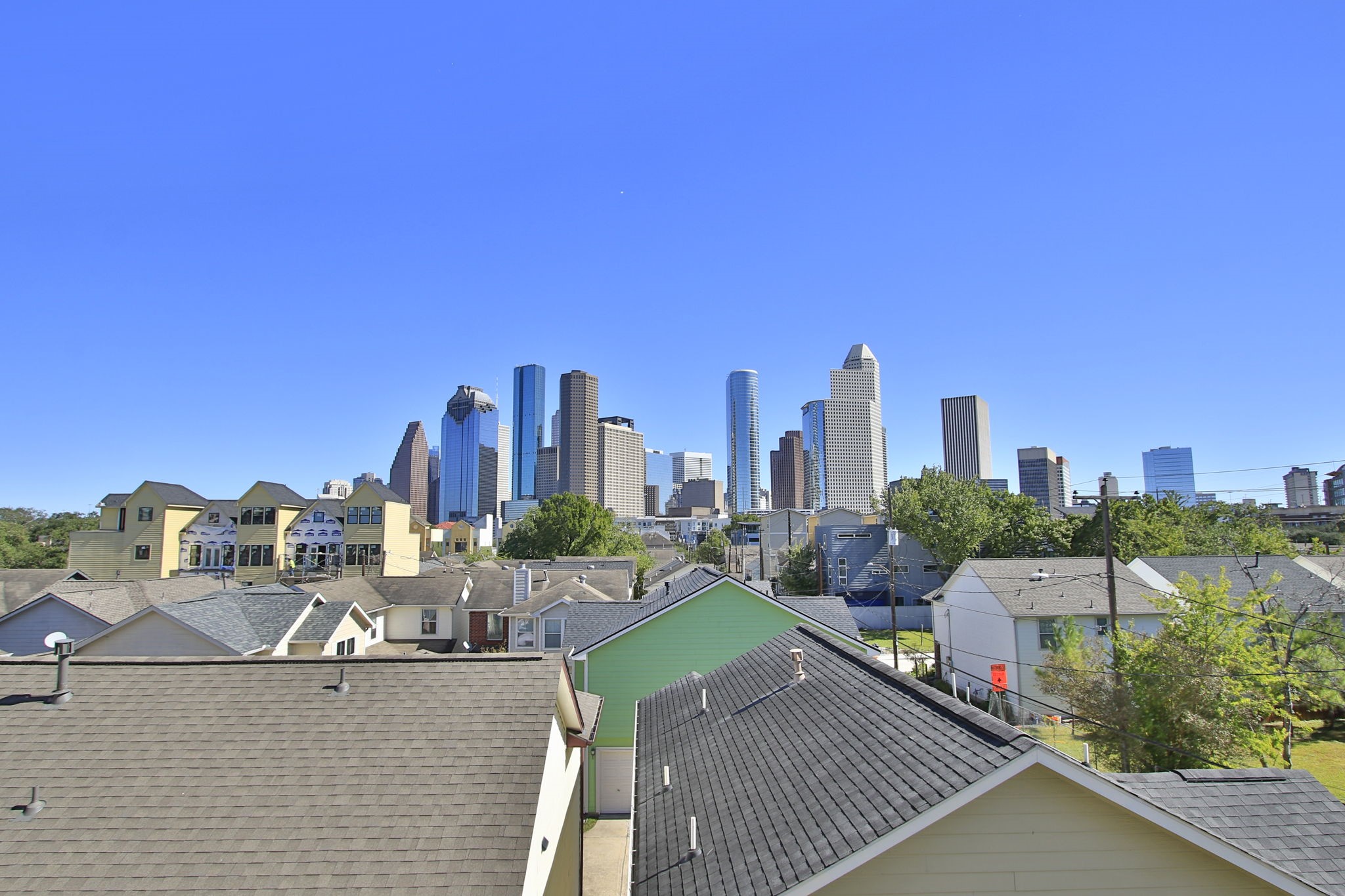 1316 Robin Street, Unit A Houston, TX 77019 - Photo 16 of 46 a view of a city with tall buildings