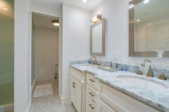a kitchen with granite countertop cabinets and a window