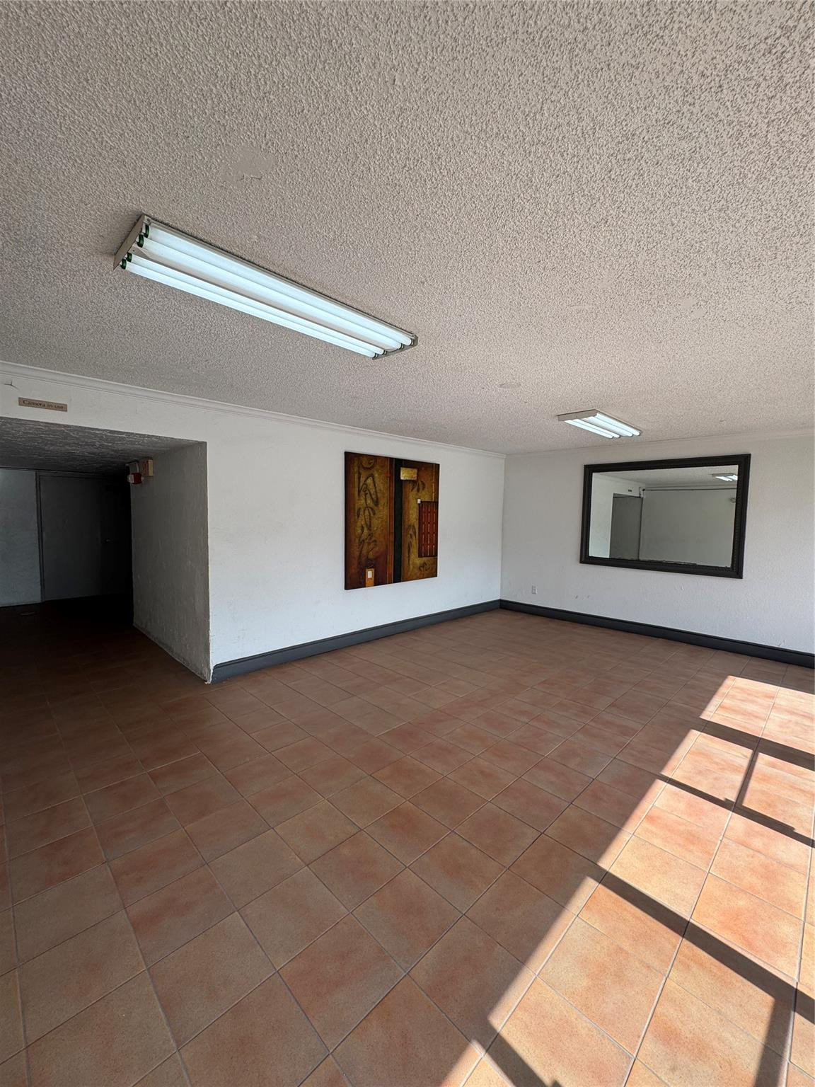 Undisclosed Address Plantation, FL 33324 - Photo 5 of 16 a view of an empty room with a window