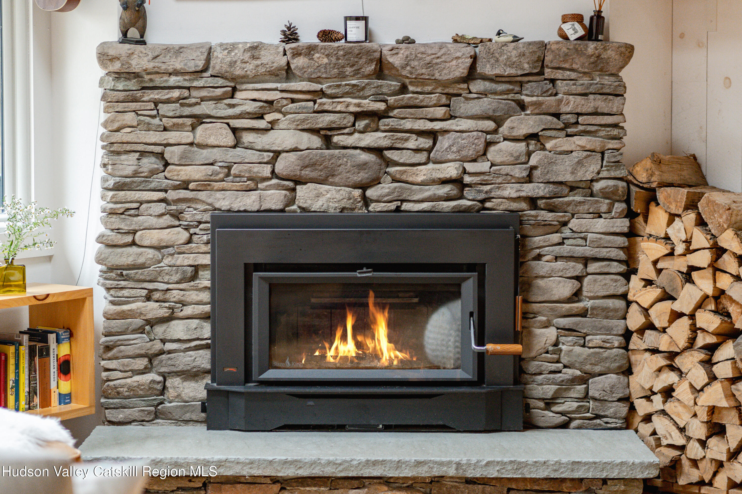 167 Pine Lane Hunter, NY 12442 - Photo 12 of 27 a room with a fireplace