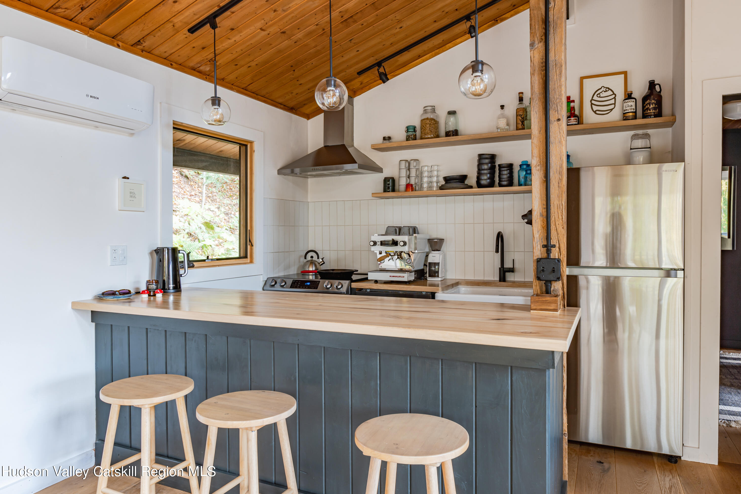 167 Pine Lane Hunter, NY 12442 - Photo 15 of 27 a kitchen with stainless steel appliances a sink and a refrigerator