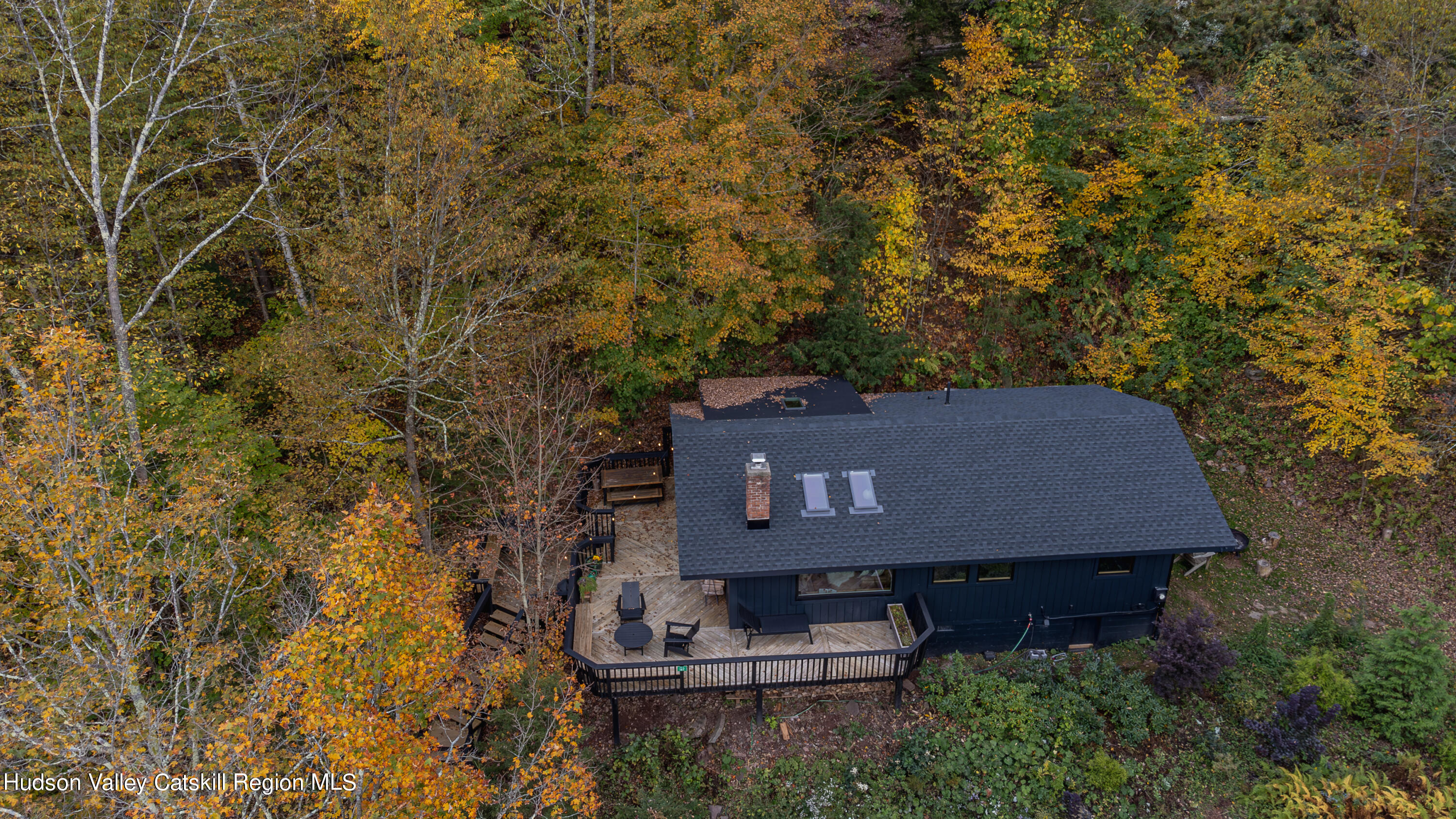 167 Pine Lane Hunter, NY 12442 - Photo 27 of 27 a view of a wooden house with a yard