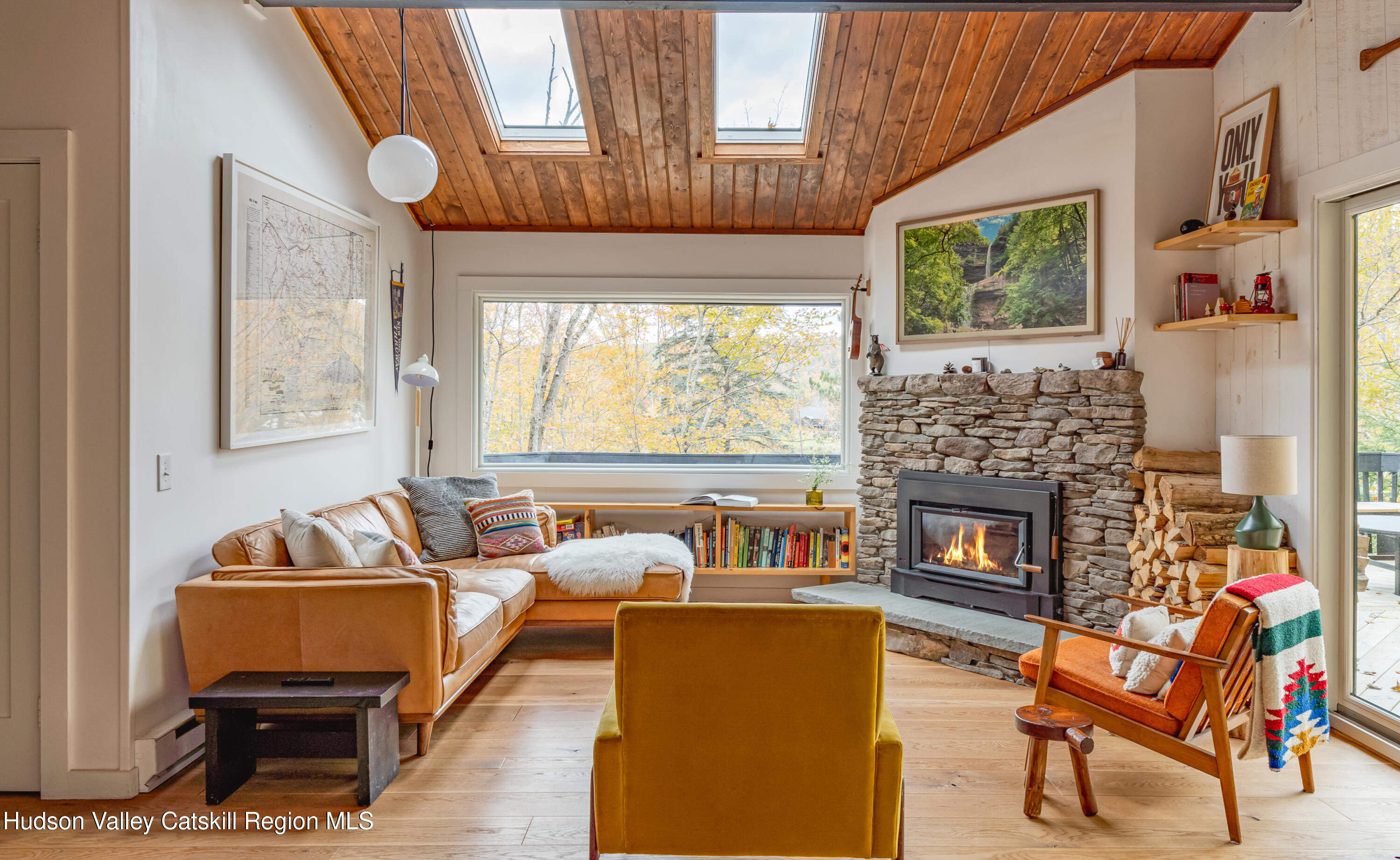 167 Pine Lane Hunter, NY 12442 - Photo 4 of 27 a living room with furniture and a fireplace