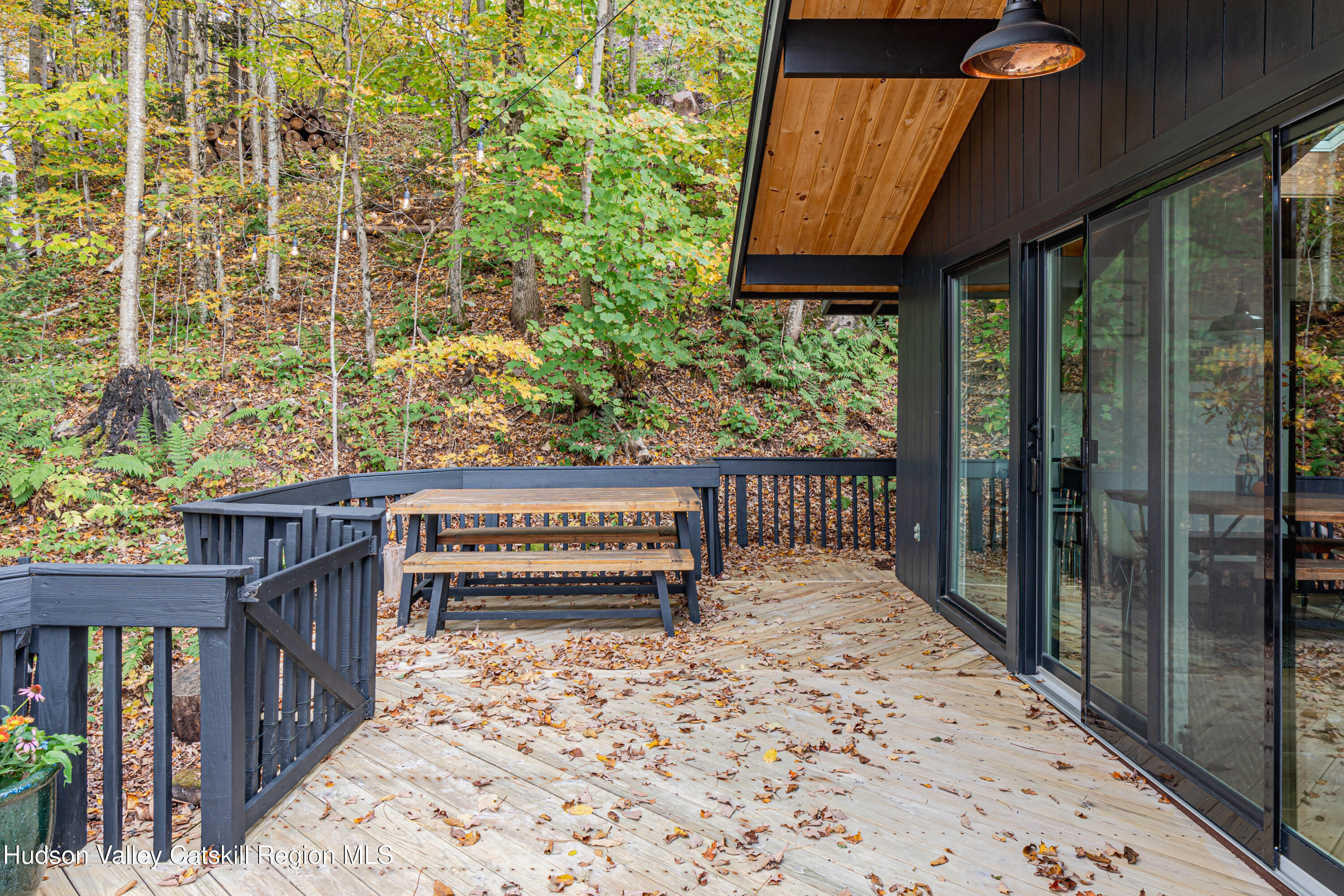 167 Pine Lane Hunter, NY 12442 - Photo 6 of 27 a balcony with trees in front of it