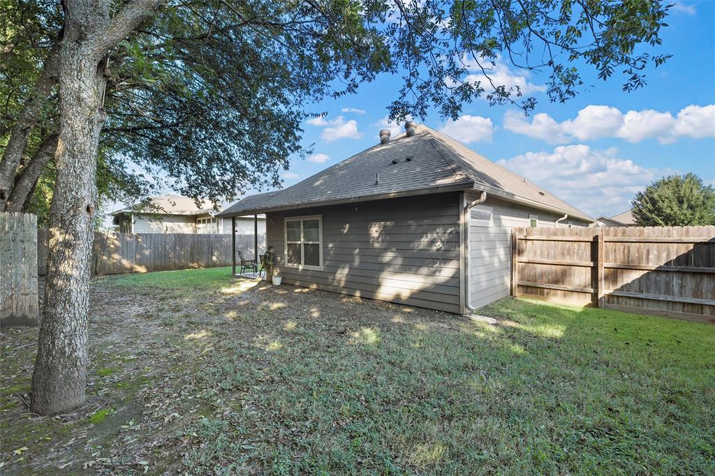 1214 Merganser Way Waco, TX 76706 - Photo 13 of 14 a view of a house with a yard and tree s