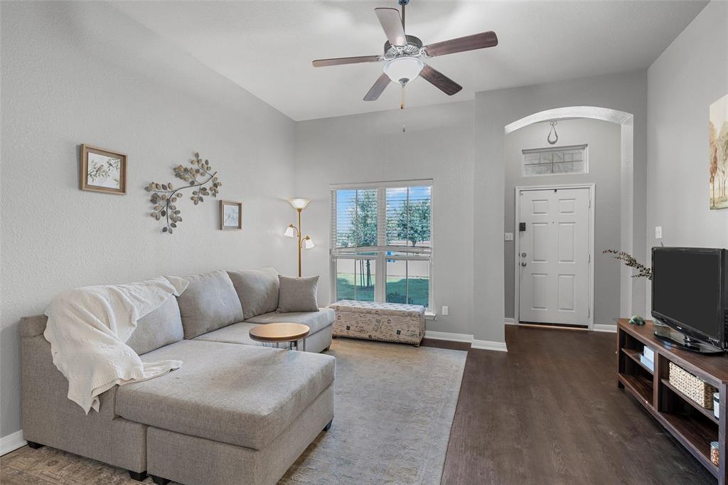 1214 Merganser Way Waco, TX 76706 - Photo 3 of 14 a living room with furniture and a flat screen tv
