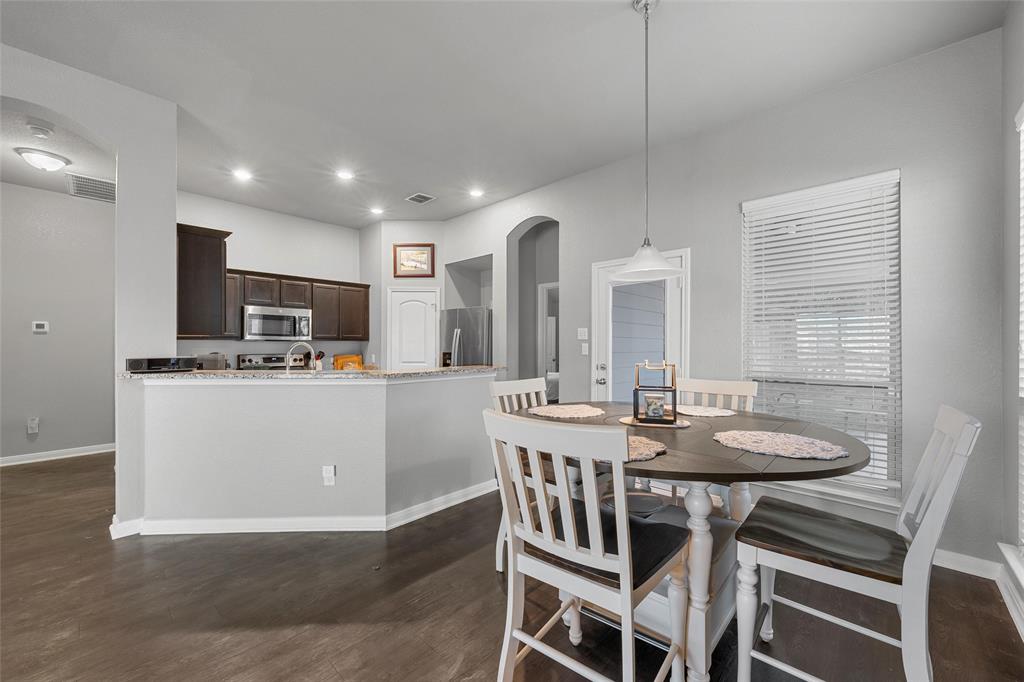 1214 Merganser Way Waco, TX 76706 - Photo 5 of 14 a view of a dining room with furniture